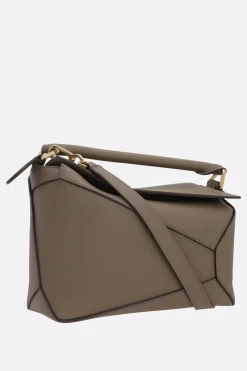 borsa a mano Puzzle Edge small in pelle martellata