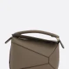 borsa a mano Puzzle Edge mini in pelle martellata