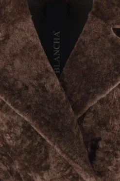 cappotto doppiopetto in astrakan merino