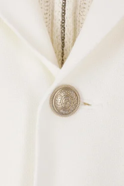 giacca in piquet e maglia con cappuccio